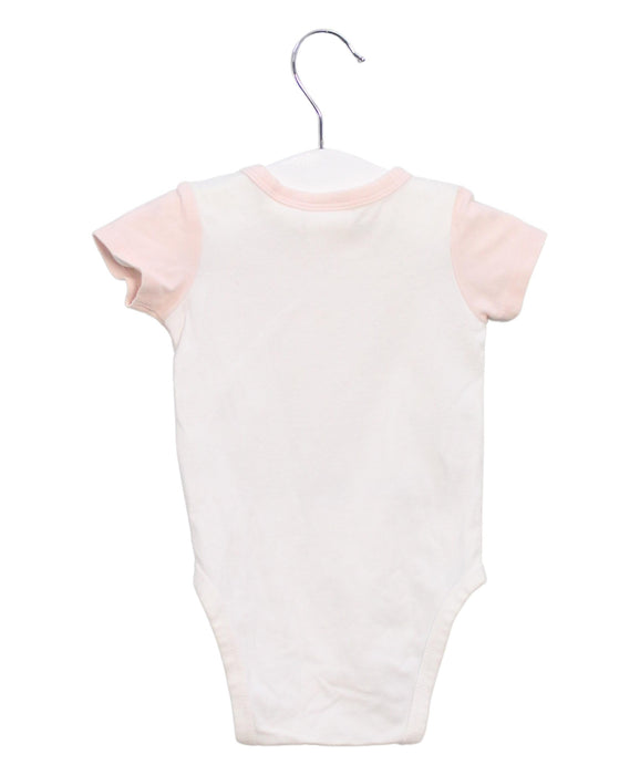 A Pink Short Sleeve Bodysuits from Seed in size Newborn for girl. (Back View)