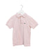 A Pink Short Sleeve Polos from Lacoste in size 6T for boy. (Front View)
