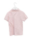 A Pink Short Sleeve Polos from Lacoste in size 6T for boy. (Back View)