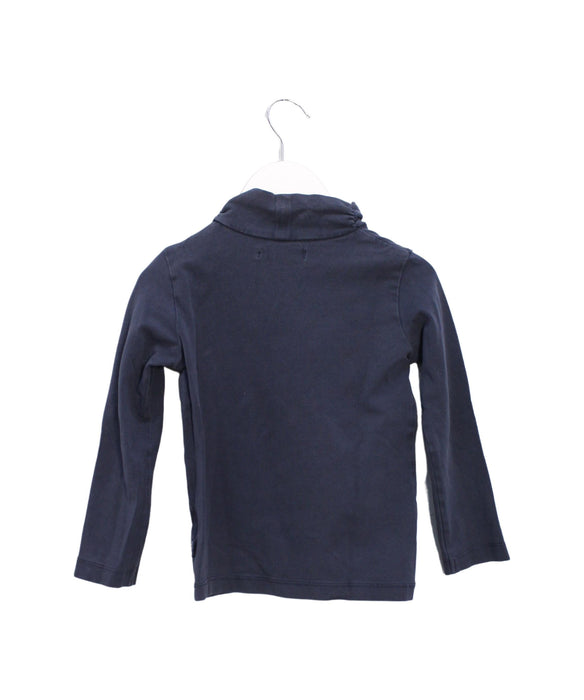 A Navy Long Sleeve Tops from Filou and Friends in size 5T for girl. (Back View)