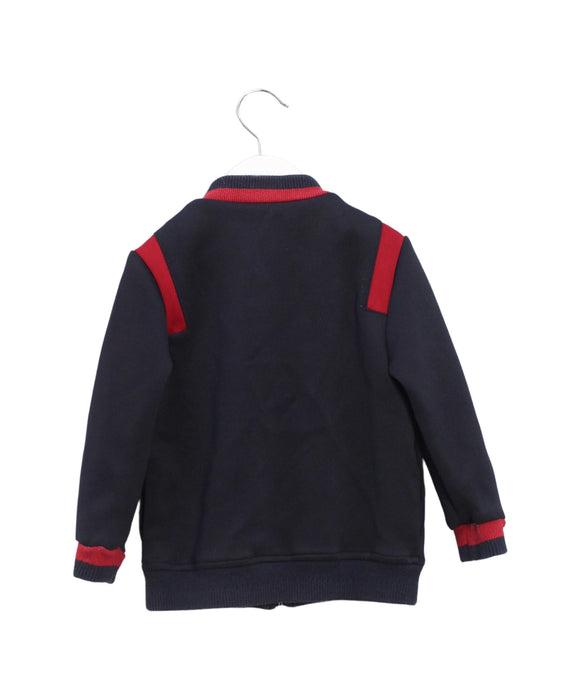 A Navy Lightweight Jackets from Jacadi in size 3T for boy. (Back View)