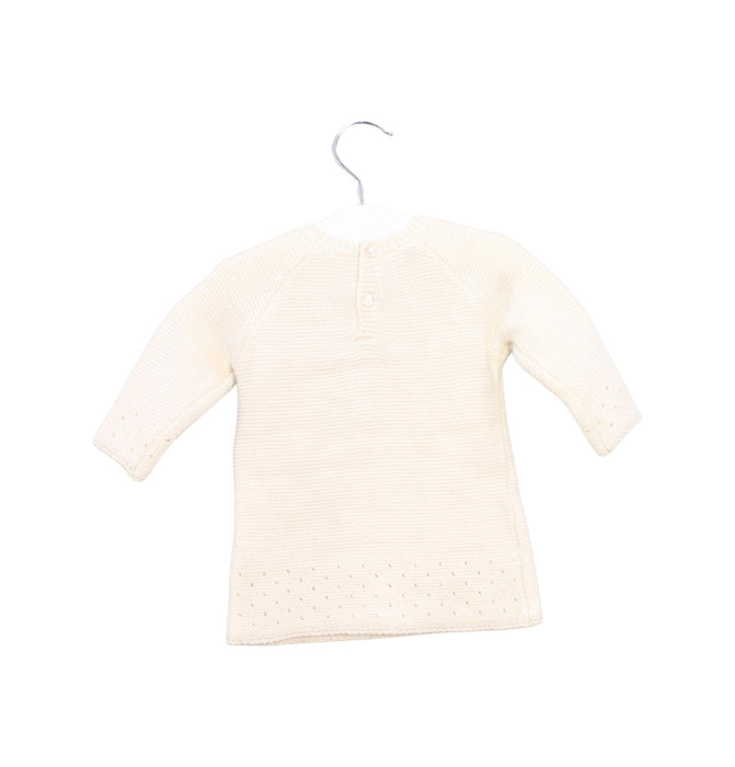 A Ivory Knit Sweaters from Jacadi in size 0-3M for girl. (Back View)
