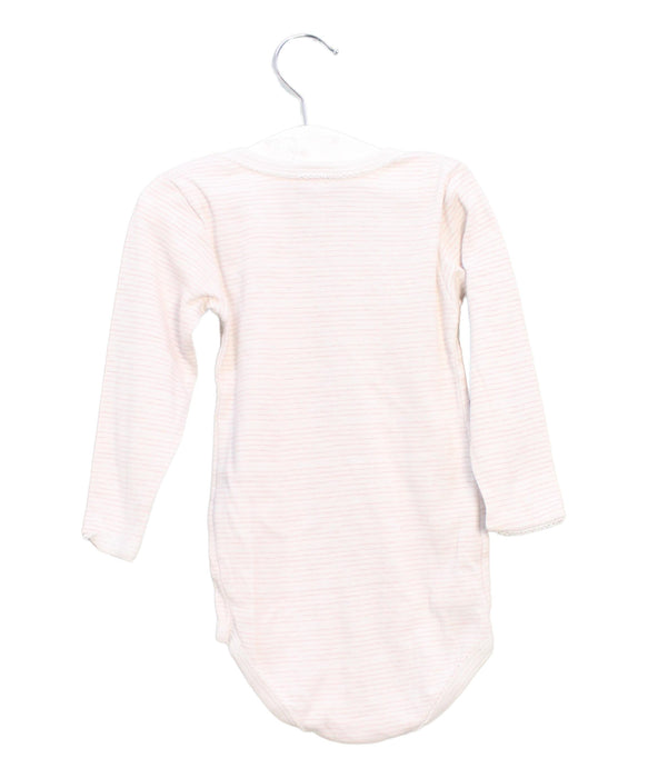 A Pink Long Sleeve Bodysuits from Petit Bateau in size 18-24M for girl. (Back View)