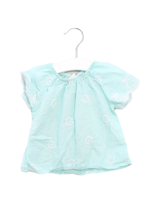 A Green Short Sleeve Tops from Seed in size 3-6M for girl. (Front View)