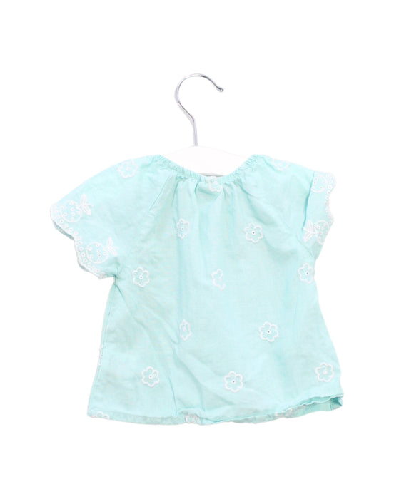 A Green Short Sleeve Tops from Seed in size 3-6M for girl. (Back View)