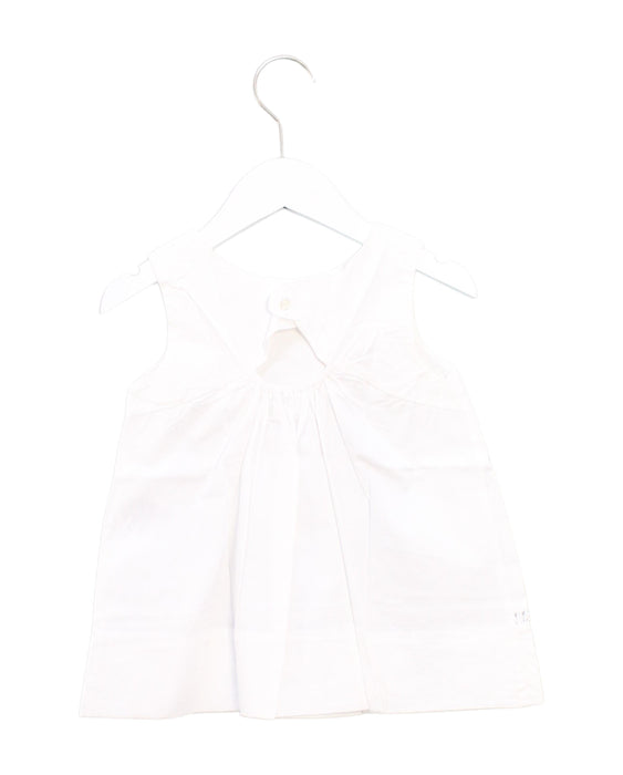 A White Sleeveless Dresses from Armani in size 4T for girl. (Back View)