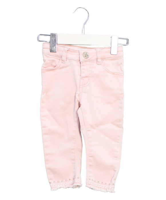 A Pink Casual Pants from IKKS in size 6-12M for girl. (Front View)