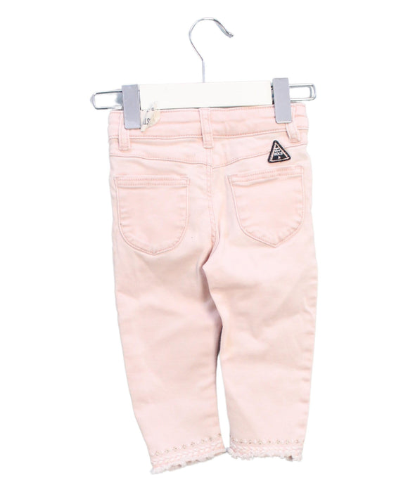 A Pink Casual Pants from IKKS in size 6-12M for girl. (Back View)