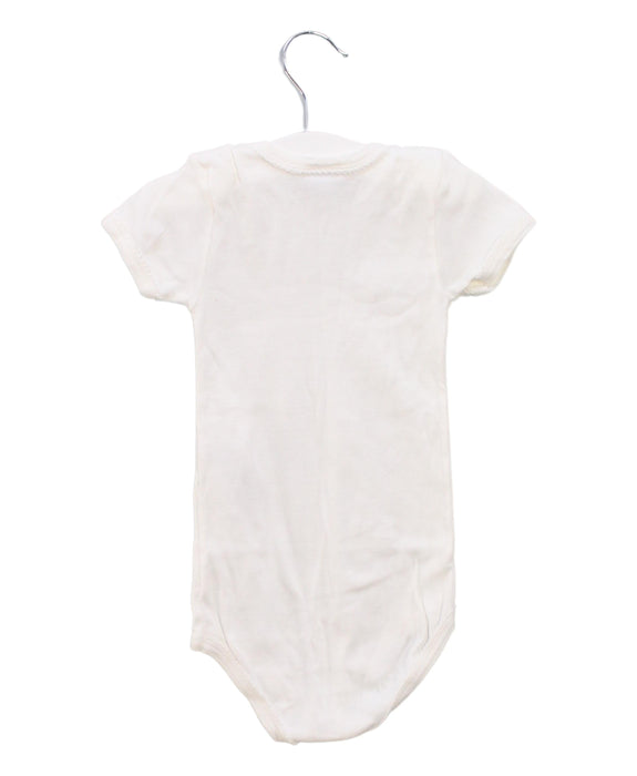 A White Short Sleeve Bodysuits from Petit Bateau in size 2T for girl. (Back View)