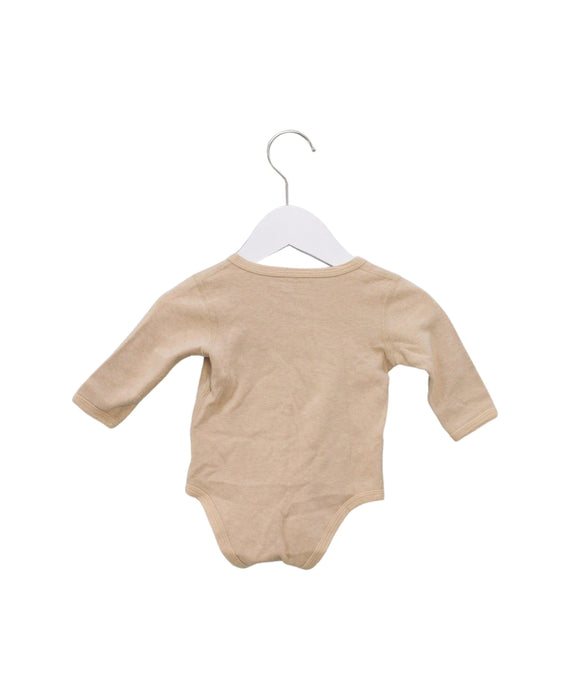 A Beige Long Sleeve Bodysuits from CIGOGNE Bébé in size 6-12M for girl. (Back View)