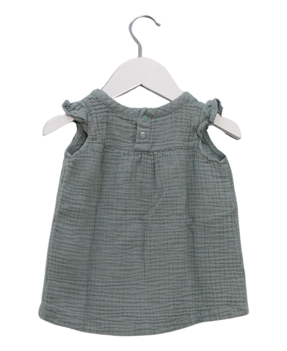 A Blue Sleeveless Dresses from Apple Park in size 6-12M for girl. (Back View)