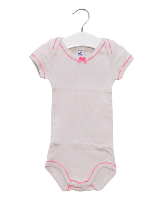 A Pink Short Sleeve Bodysuits from Petit Bateau in size 6-12M for girl. (Front View)