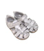 A Silver Sandals from Clarks in size 2T for girl. (Front View)