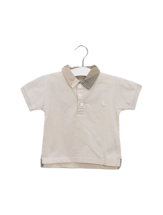 A Beige Short Sleeve Polos from Burberry in size 6-12M for boy. (Front View)