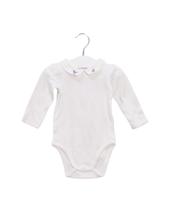 A White Long Sleeve Bodysuits from Jacadi in size 3-6M for girl. (Front View)