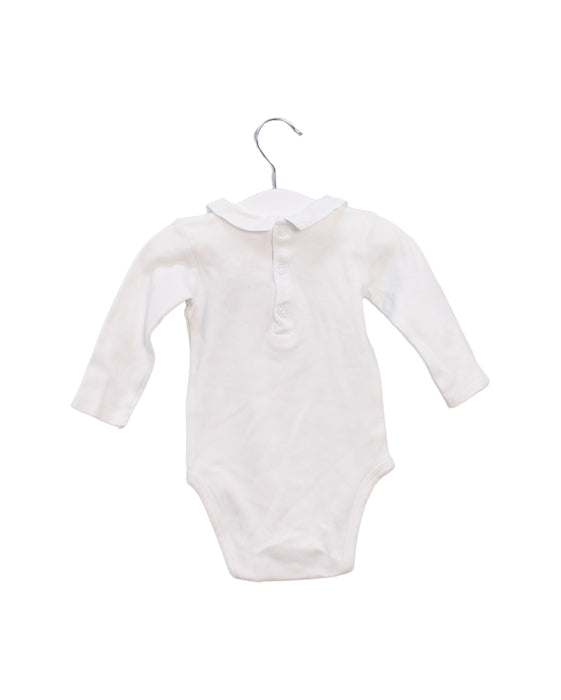 A White Long Sleeve Bodysuits from Jacadi in size 3-6M for girl. (Back View)