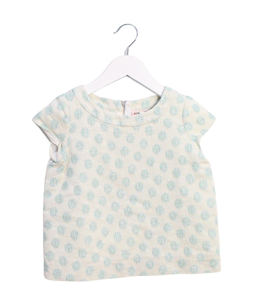 A Ivory Short Sleeve Tops from Bonpoint in size 6T for girl. (Front View)