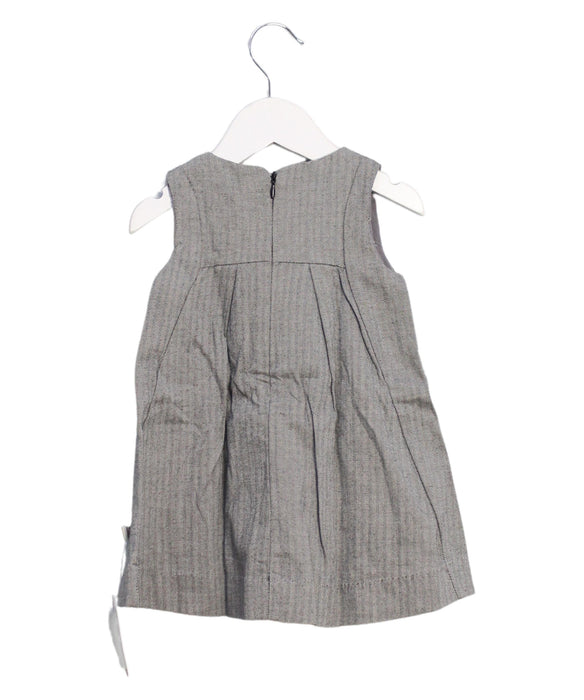 A Grey Sleeveless Dresses from Kanz in size 3-6M for girl. (Back View)
