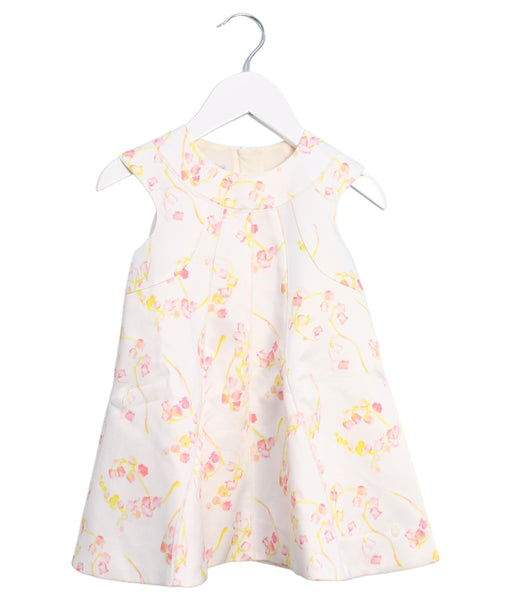 A White Sleeveless Dresses from Dior in size 12-18M for girl. (Front View)