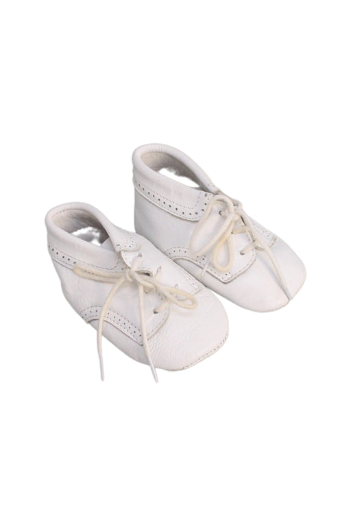 A White Booties from Jacadi in size 6-12M for girl. (Front View)