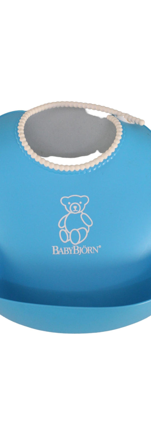 A Blue Bibs from BabyBjorn in size O/S for boy. (Front View)