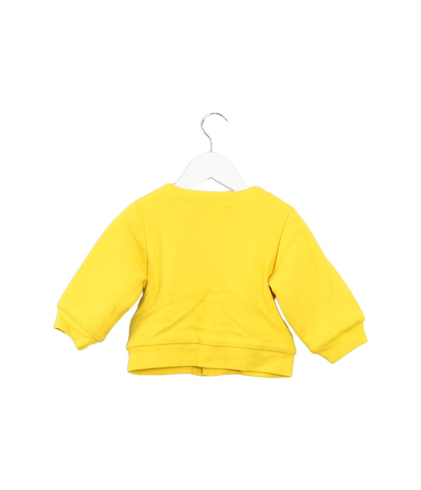 A Yellow Lightweight Jackets from Mides in size 6-12M for boy. (Back View)