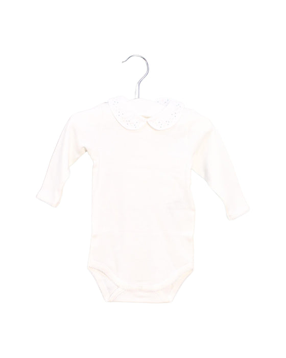 A Ivory Long Sleeve Bodysuits from Bonpoint in size 0-3M for girl. (Front View)