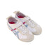 A White Sneakers from Onitsuka Tiger in size 4T for girl. (Front View)