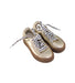 A Gold Sneakers from Stella McCartney in size 6T for girl. (Front View)
