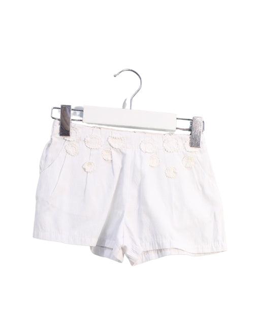 A White Shorts from Gingersnaps in size 12-18M for girl. (Front View)