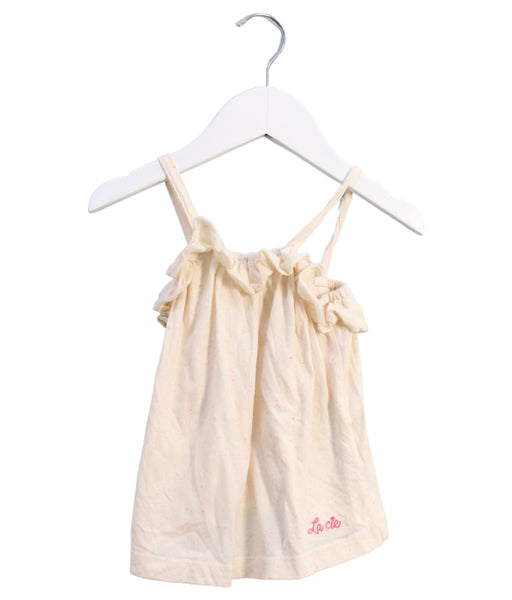 A Ivory Sleeveless Tops from La Compagnie des Petits in size 2T for girl. (Front View)