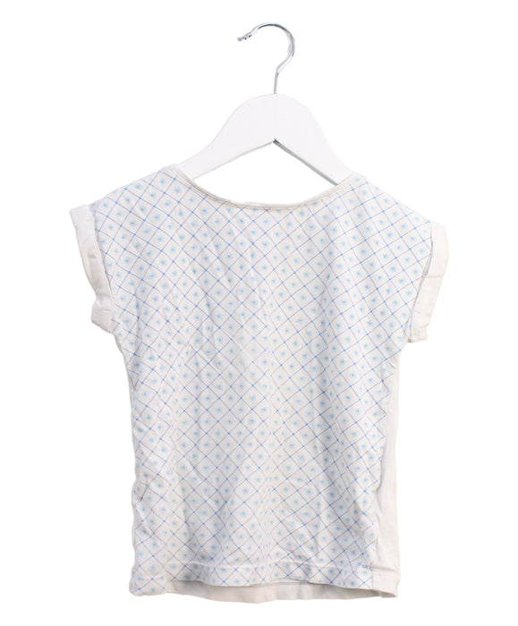 A White Short Sleeve Tops from Jacadi in size 4T for girl. (Front View)