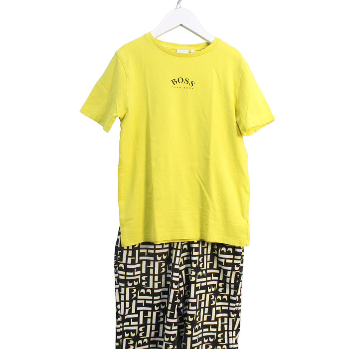 A Yellow Shorts from Boss in size 10Y for boy. (Front View)