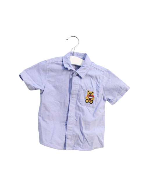 A Blue Shirts from Guess in size 12-18M for boy. (Front View)