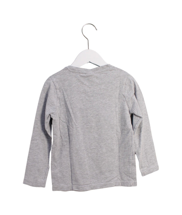 A Grey Long Sleeve Tops from Jacadi in size 6T for boy. (Back View)
