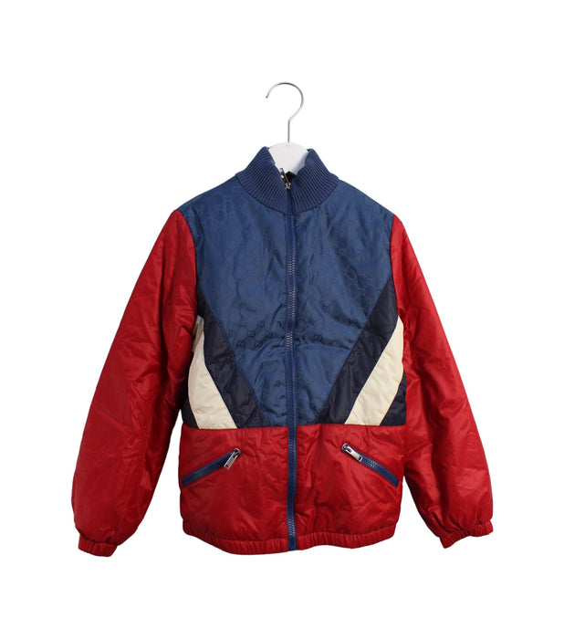 A Red Puffer/Quilted Jackets from Gucci in size 8Y for boy. (Front View)