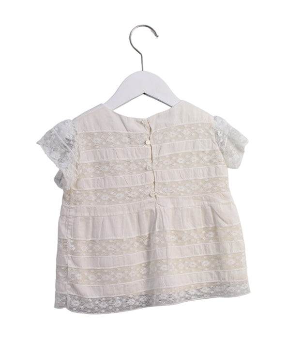 A White Short Sleeve Dresses from Bonpoint in size 3T for girl. (Back View)
