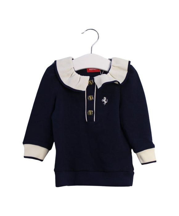 A Navy Buttoned Sweatshirts from Ferrari in size 6-12M for girl. (Front View)