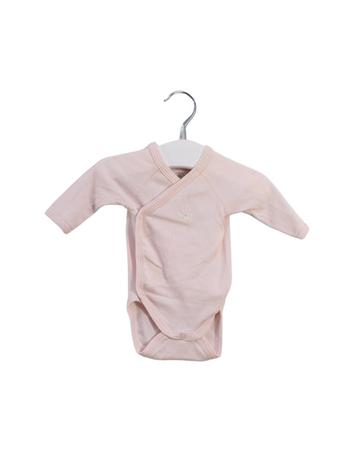 A Pink Long Sleeve Bodysuits from Petit Bateau in size Newborn for girl. (Front View)
