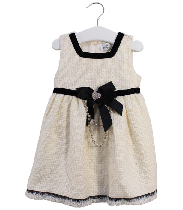 A White Sleeveless Dresses from Lesy in size 6-12M for girl. (Front View)