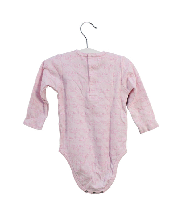 A Pink Long Sleeve Bodysuits from Dior in size 6-12M for girl. (Back View)