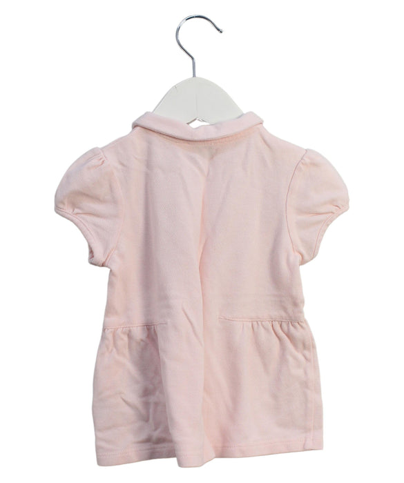 A Pink Short Sleeve Polos from Cyrillus in size 3T for girl. (Back View)