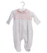 A White Onesies from Armani in size 0-3M for girl. (Front View)
