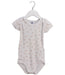 A Beige Short Sleeve Bodysuits from Petit Bateau in size 18-24M for girl. (Front View)