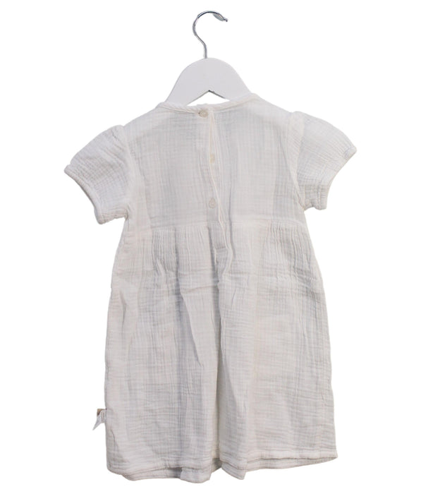 A White Short Sleeve Dresses from Dave & Bella in size 3T for girl. (Back View)