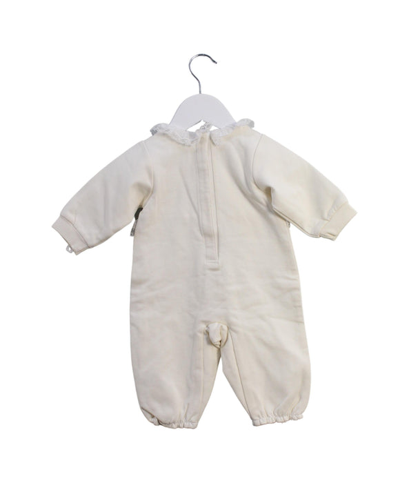 A Ivory Long Sleeve Jumpsuits from Chickeeduck in size 0-3M for girl. (Back View)