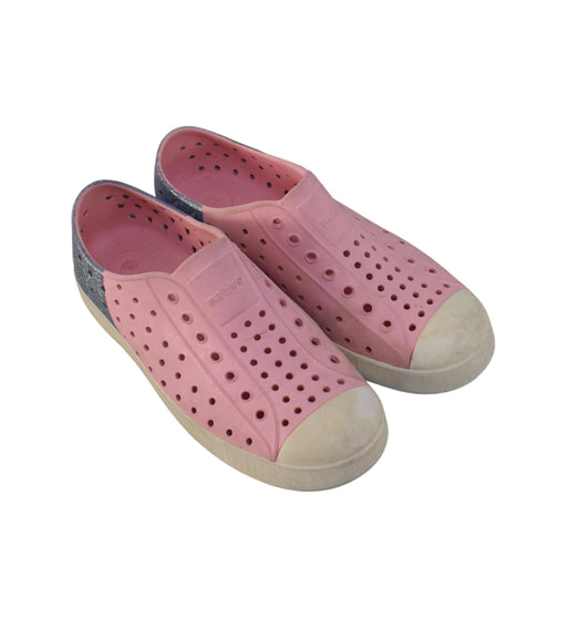 A Pink Aqua Shoes from Native Shoes in size 10Y for girl. (Front View)