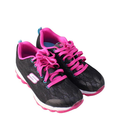 A  Sneakers from Skechers in size 11Y for girl. (Front View)