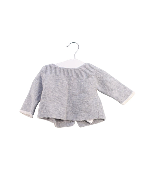 A Grey Knit Sweaters from Jacadi in size 0-3M for girl. (Front View)