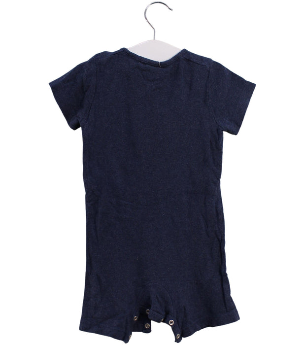 A Navy Short Sleeve Rompers from Purebaby in size 6-12M for boy. (Back View)